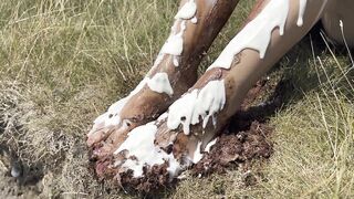 Smashing a cake with my feet. The chocolate and cream gateaux feels so nice between my toes